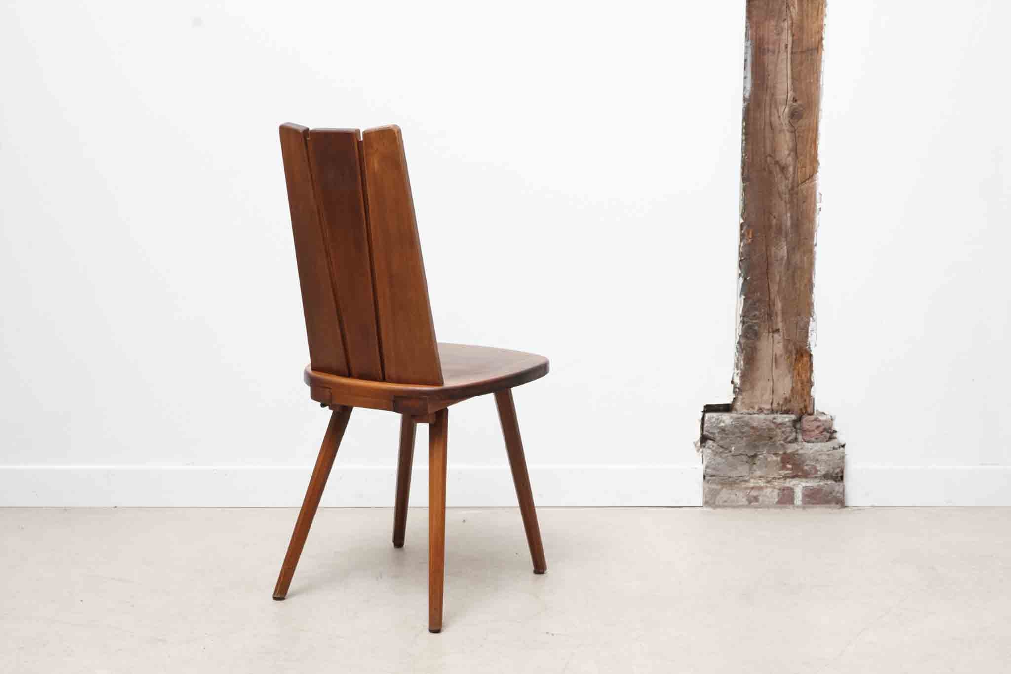 Chaise brutaliste bois massif