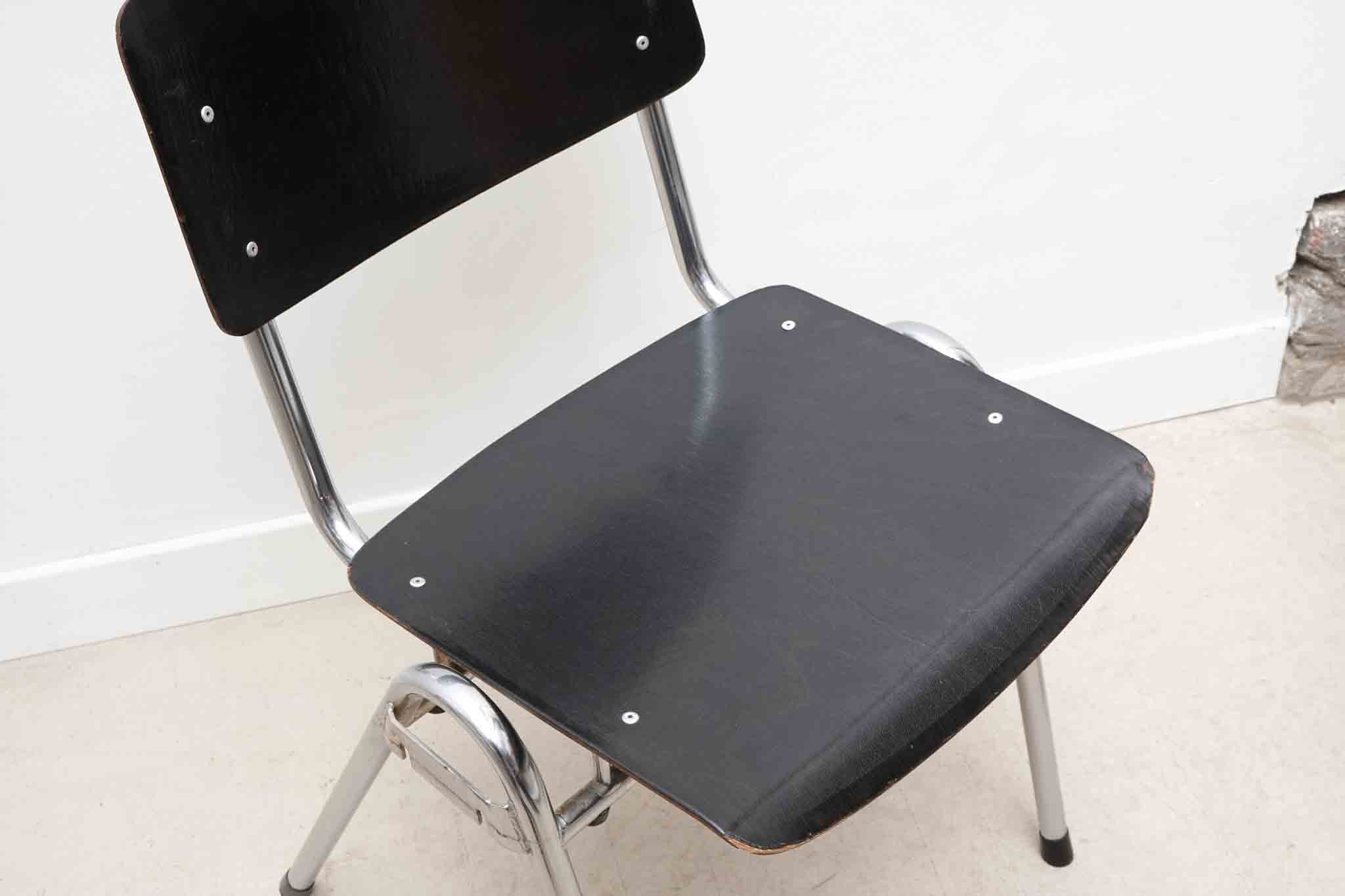 Chaise Eromes empilable noire / chrome