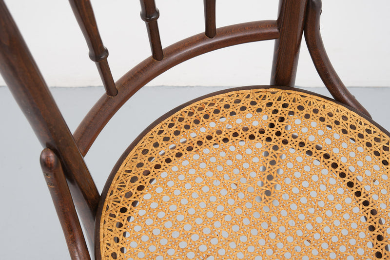 Wood and caning bistro chair
