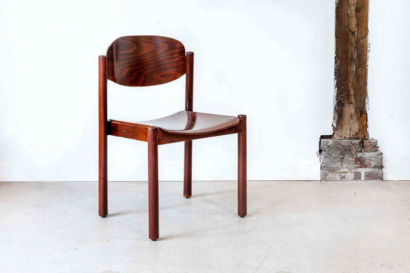 Chaise vintage en bois empilable couleur acajou profond