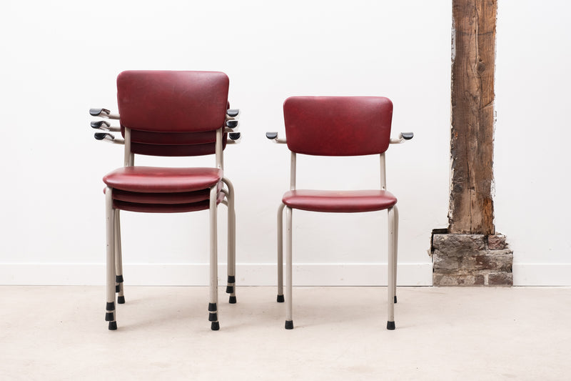 Chair with armrests in burgundy faux leather