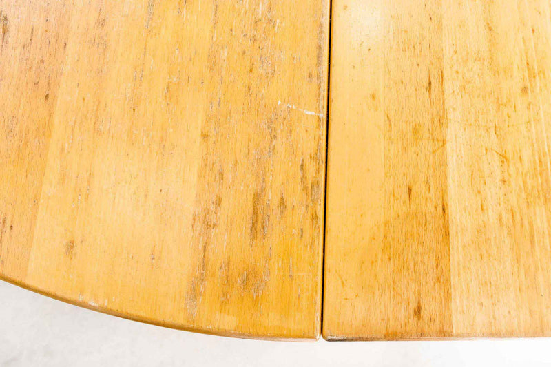 Table ronde vintage en bois massif extensible