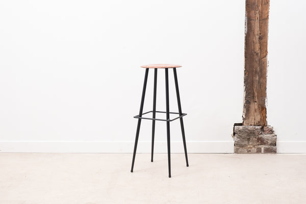 Bar stool with thin metal legs